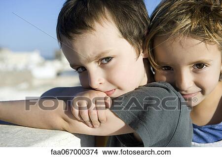 Picture - Young brother and sister, portrait. Fotosearch