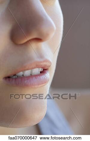 Stock Photo - Close-up of woman's nose and mouth. Fotosearch