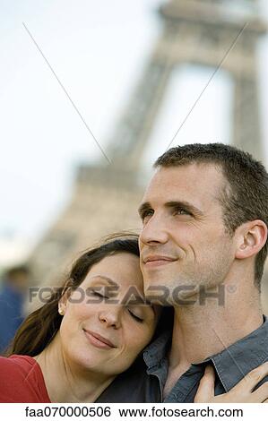 Couple embracing outdoors View Large Photo Image Stock Photograph - Couple embracing outdoors. Fotosearch