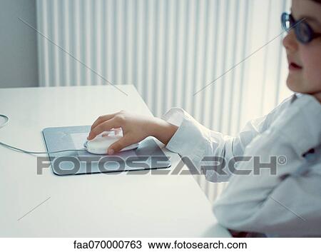 Girl using computer mouse, focus on hand View Large Photo Image Stock Image - Girl using computer mouse, focus on hand. Fotosearch