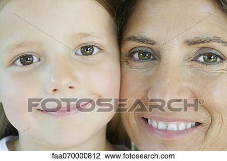 Stock Image - Grandmother and granddaughter, portrait. Fotosearch