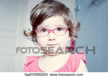 Little girl with glasses, portrait View Large Photo Image Picture - Little girl with glasses, portrait. Fotosearch