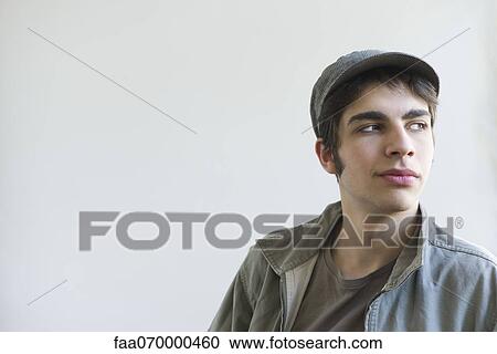 Male looking away in thought, portrait View Large Photo Image Stock Image - Male looking away in thought, portrait. Fotosearch