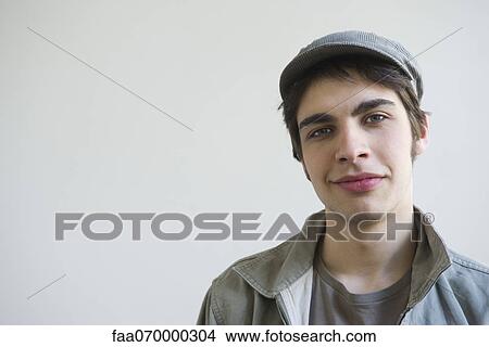 Male smiling at camera, portrait View Large Photo Image Picture - Male smiling at camera, portrait. Fotosearch