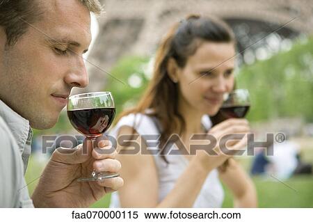 Man enjoying bouquet of red wine outdoors View Large Photo Image Stock Photography - Man enjoying bouquet of red wine outdoors. Fotosearch