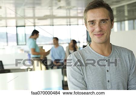 Man in office, portrait View Large Photo Image Picture - Man in office, portrait. Fotosearch