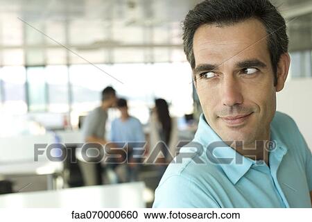 Man in office, portrait View Large Photo Image Stock Image - Man in office, portrait. Fotosearch