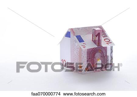 Model house folded with euro banknote View Large Photo Image Picture - Model house folded with euro banknote. Fotosearch