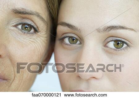 Stock Image - Mother and daughter, close-up portrait. Fotosearch