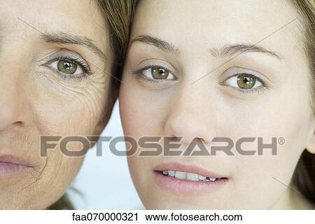 Stock Image - Mother and daughter, close-up portrait. Fotosearch