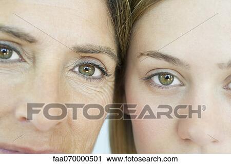 Stock Image - Mother and daughter, close-up portrait. Fotosearch