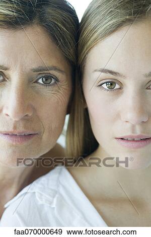 Stock Photo - Mother and daughter, close-up portrait. Fotosearch