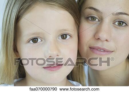 Mother and daughter, portrait View Large Photo Image Stock Image - Mother and daughter, portrait. Fotosearch