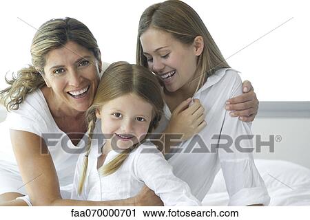 Mother and two daughters, portrait View Large Photo Image Stock Image - Mother and two daughters, portrait. Fotosearch