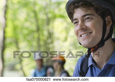 Mountain biker smiling View Large Photo Image Stock Image - Mountain biker smiling. Fotosearch