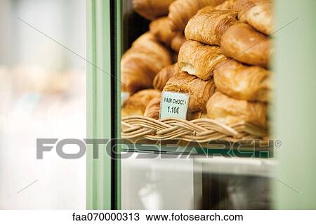 Stock Image - Pastries in bakery display. Fotosearch
