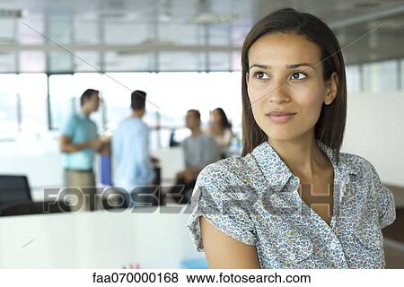 Stock Photo - Professional woman in office, portrait. Fotosearch