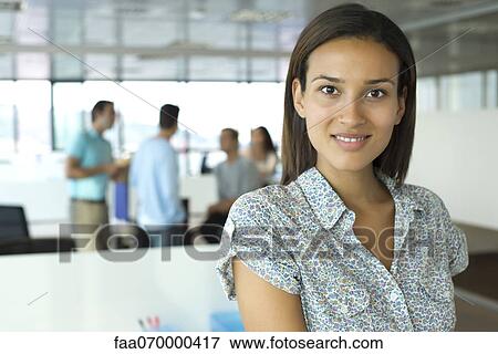 Stock Photo - Professional woman in office, portrait. Fotosearch