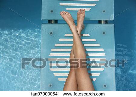 Relaxing poolside View Large Photo Image Stock Image - Relaxing poolside. Fotosearch