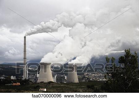 Smoke coming out of factory smokestacks View Large Photo Image Stock Photograph - Smoke coming out of factory smokestacks. Fotosearch