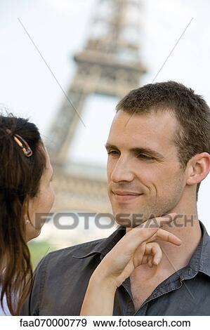 Woman caressing man's face View Large Photo Image Stock Photo - Woman caressing man's face. Fotosearch