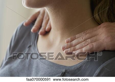 Woman receiving shoulder massage View Large Photo Image Stock Image - Woman receiving shoulder massage. Fotosearch
