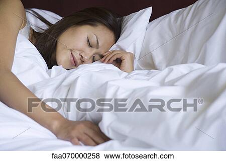Woman sleeping View Large Photo Image Stock Photo - Woman sleeping. Fotosearch