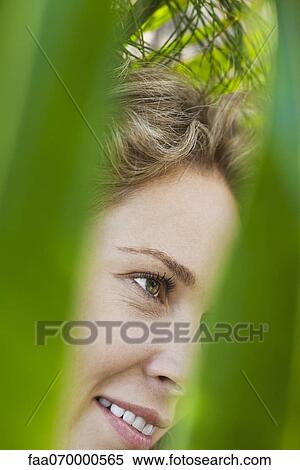 Woman with air of contentment View Large Photo Image Stock Photography - Woman with air of contentment. Fotosearch