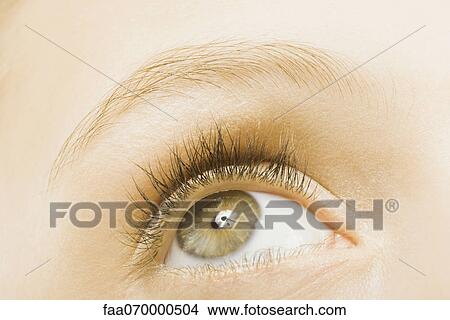 Picture - Woman's eye, looking up. Fotosearch