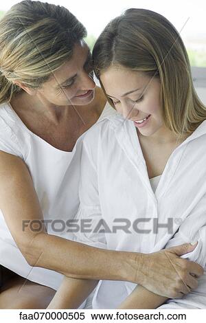 Women embracing View Large Photo Image Stock Photography - Women embracing. Fotosearch