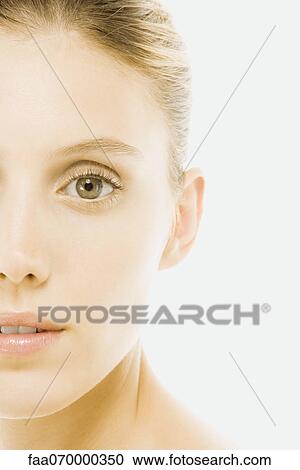 Young woman, looking at camera, portrait View Large Photo Image Stock Image - Young woman, looking at camera, portrait. Fotosearch