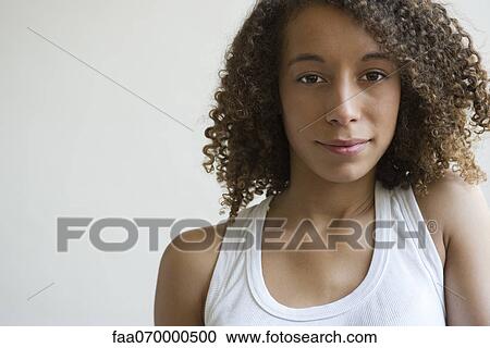 Stock Image - Young woman, portrait. Fotosearch