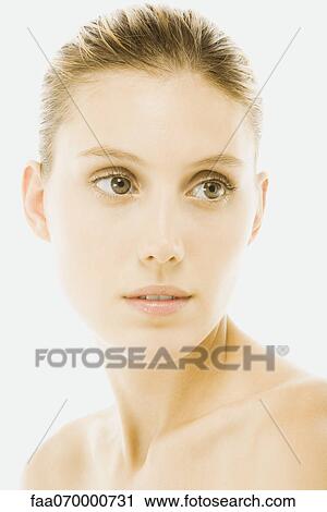 Young woman with bare shoulders, looking away, portrait View Large Photo Image Stock Image - Young woman with bare shoulders, looking away, portrait. Fotosearch