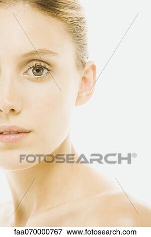 Young woman with bare shoulders, portrait, cropped View Large Photo Image Stock Photo - Young woman with bare shoulders, portrait, cropped. Fotosearch