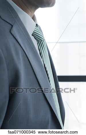 Business executive in suit, mid section View Large Photo Image Stock Photography - Business executive in suit, mid section. Fotosearch