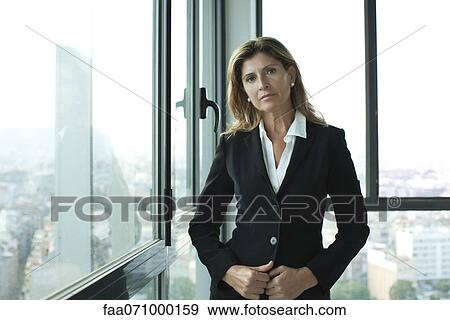 Stock Photo - Businesswoman in suit. Fotosearch