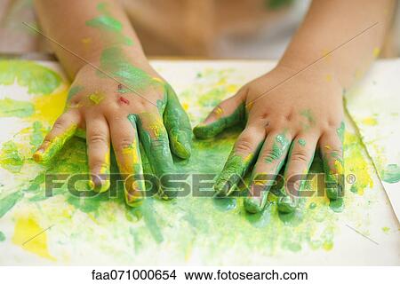 Picture - Child finger painting, cropped. Fotosearch