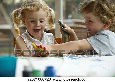 Children playing with paint together View Large Photo Image Stock Image - Children playing with paint together. Fotosearch