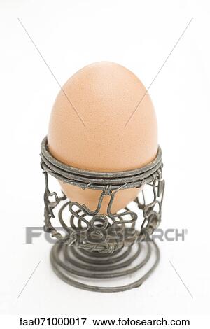 Egg in egg cup View Large Photo Image Stock Photo - Egg in egg cup. Fotosearch