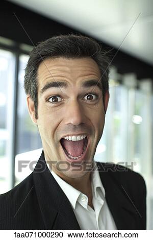 Executive making surprised face View Large Photo Image Stock Image - Executive making surprised face. Fotosearch