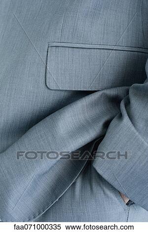 Executive with hand in pocket, cropped, full frame View Large Photo Image Stock Photography - Executive with hand in pocket, cropped, full frame. Fotosearch