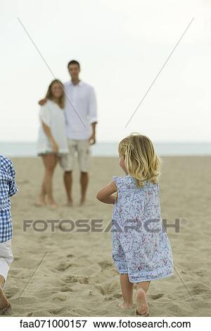 Family at the beach View Large Photo Image Stock Photo - Family at the beach. Fotosearch