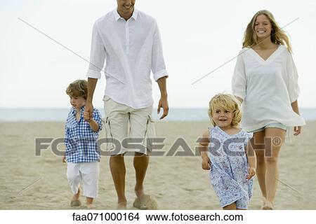 Family having fun at the beach View Large Photo Image Picture - Family having fun at the beach. Fotosearch