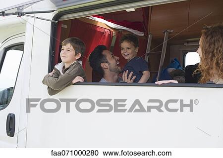 Family in motor home View Large Photo Image Stock Image - Family in motor home. Fotosearch