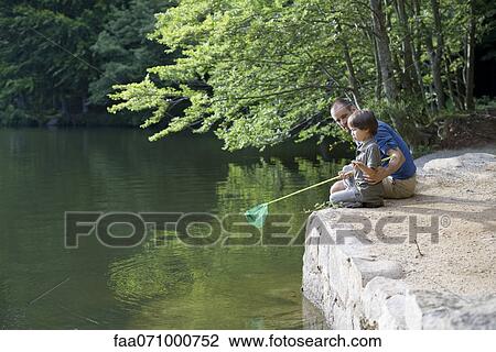 Father and son fishing View Large Photo Image Stock Image - Father and son fishing. Fotosearch