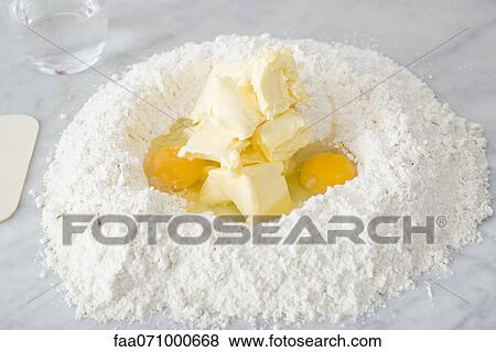 Flour, butter, and eggs View Large Photo Image Stock Photo - Flour, butter, and eggs. Fotosearch