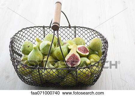 Fresh figs in basket View Large Photo Image Stock Image - Fresh figs in basket. Fotosearch