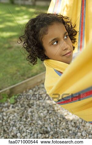 Girl relaxing in hammock View Large Photo Image Picture - Girl relaxing in hammock. Fotosearch