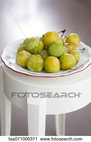 Greengage plums in bowl View Large Photo Image Stock Image - Greengage plums in bowl. Fotosearch