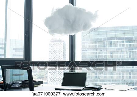 Laptop computer on desk, cloud above laptop computer View Large Photo Image Stock Photo - Laptop computer on desk, cloud above laptop computer. Fotosearch